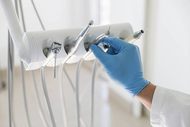 Professional Tooth Extraction technician working in Haltom City, TX